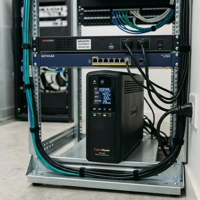 UPS uninterruptible power supply unit providing backup power for CCTV recorder and network switch